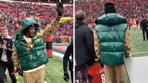 Lamar Jackson Rocks ,000 Gucci Fit For Louisville Ceremony